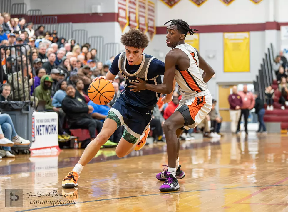 Manasquan sophomore Darius Adams guarded by Middle Twp. sophomore Jamir McNeil. (Photo: Tom Smith | tspsportsimages.com)