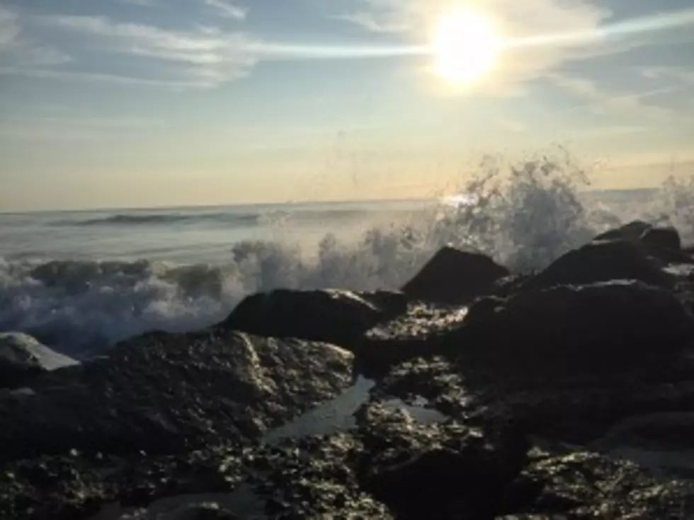 Heavy surf crashes onto the rocks near the beach in Asbury Park